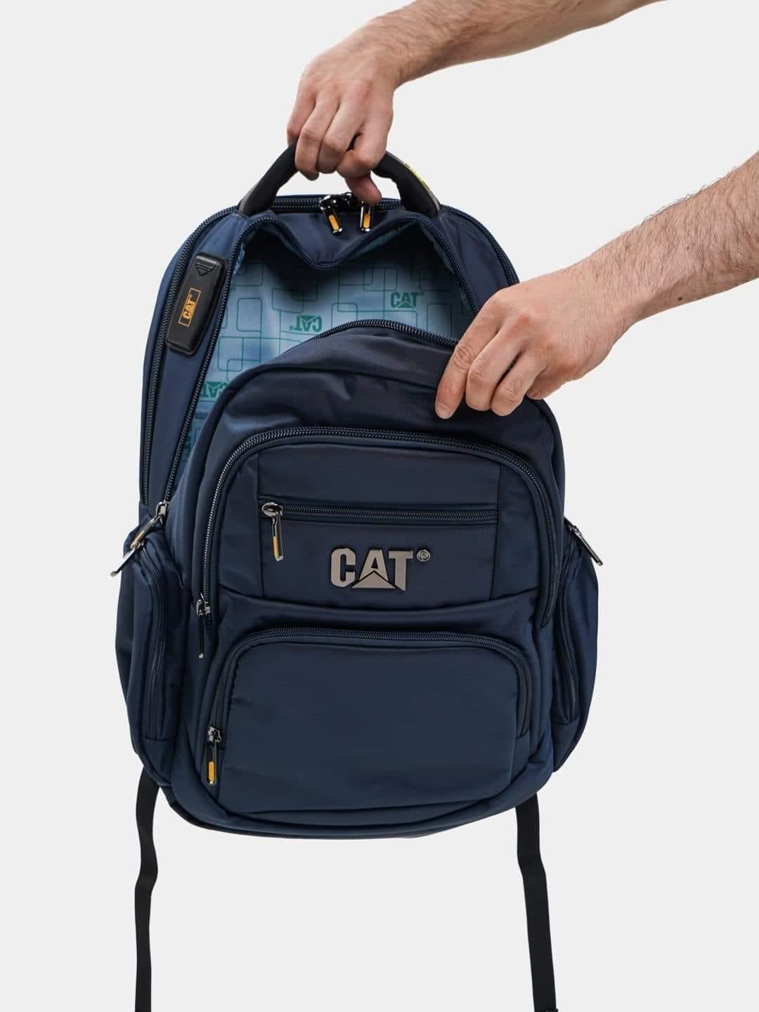 Caterpillar Business Travel Backpack with USB Charging Port & AUX Cable 15.6″ with Bubble Padding Laptop Compartment with Rain Cover Men & Women